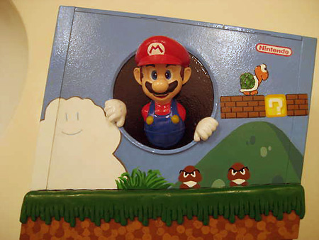 Mario jumping out of a Wii