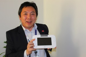 Katsuya Eguchi holding the Wii U controller